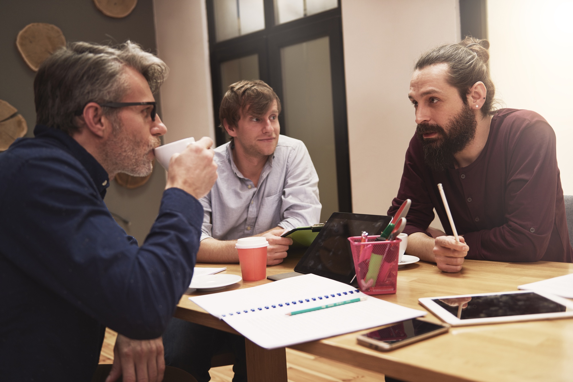 group-creative-people-analyzing-result-work